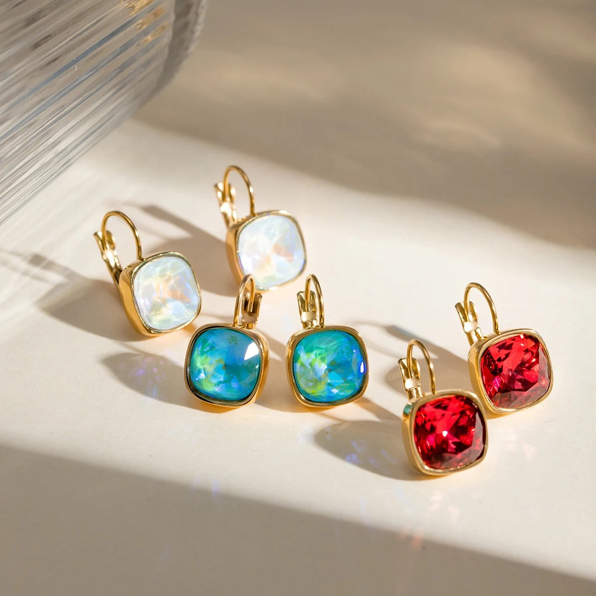 WHITE GEMSTONE HUGGIE EARRINGS