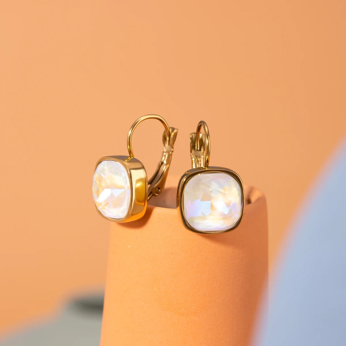WHITE GEMSTONE HUGGIE EARRINGS
